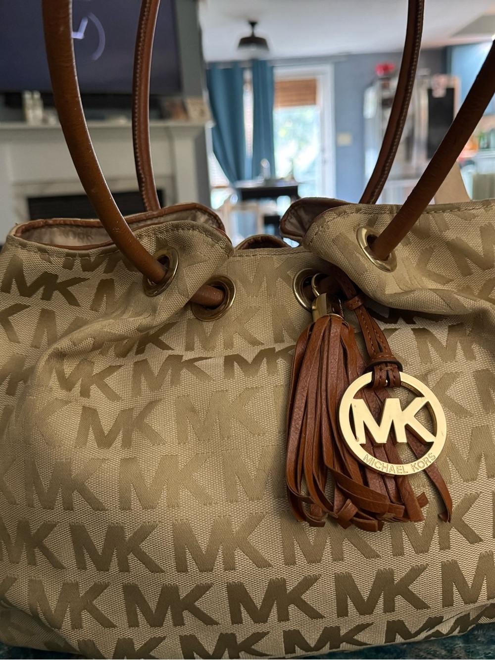 Michael Kors Beige Tan MK Logo Drawstring Shoulder Bag with Tassel